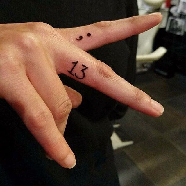 Small Number Thirteen And Semicolon Tattoos On Fingers