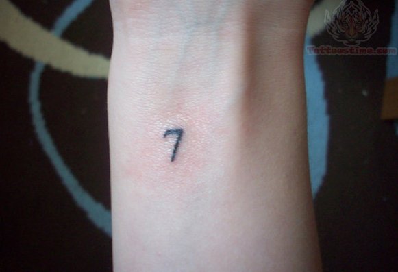 Small Seven Number Tattoo On Wrist