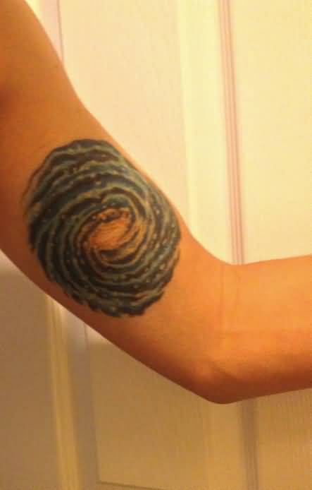 Small Spiral Fractal Galaxy Tattoo On Biceps