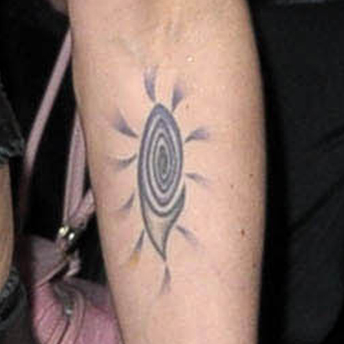 Small Spiral Rays Tattoo On Forearm