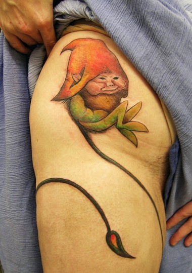 Spectacular Gnome With Long Tail Tattoo On Thigh