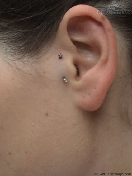 Surface Ear Piercing With Opal Barbell