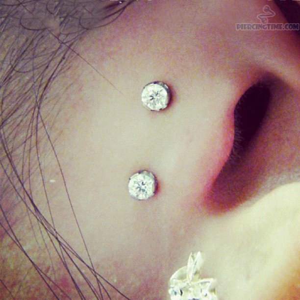 Surface Ear Piercing With Silver Anchors