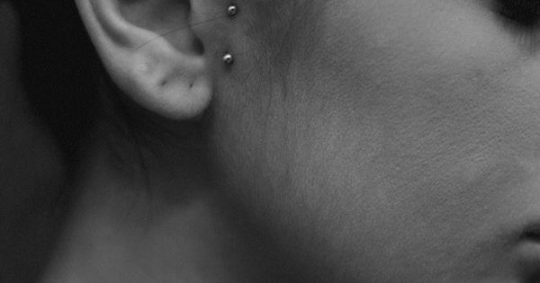 Surface Ear Piercings With Silver Barbell