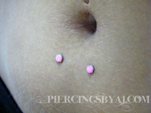 Surface Navel Piercing With Pink Opal Studs
