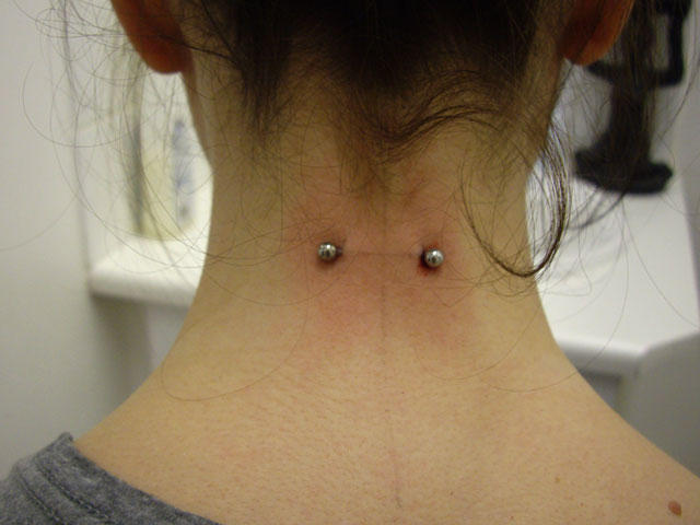 Surface Neck Piercing With Barbell For Girls