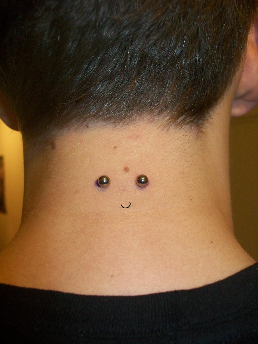 Surface Neck Piercing With Barbells