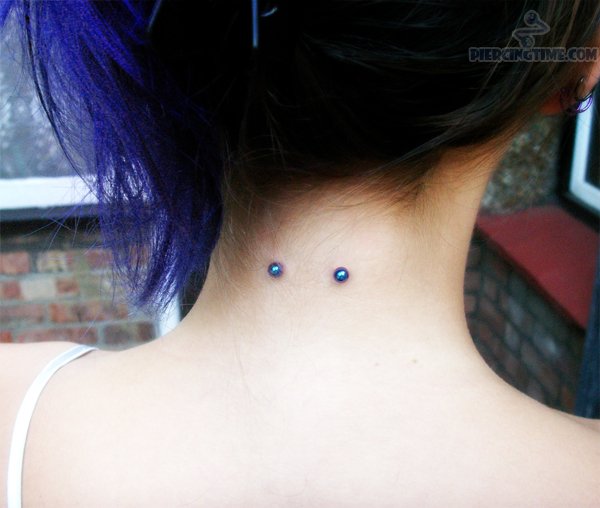 Surface Neck Piercing With Blue Barbell