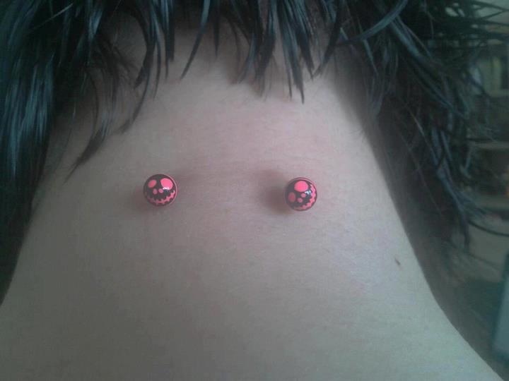 Surface Neck Piercing With Pink Studs