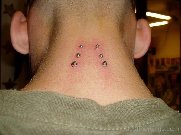 Surface Neck Piercing With Silver Barbells