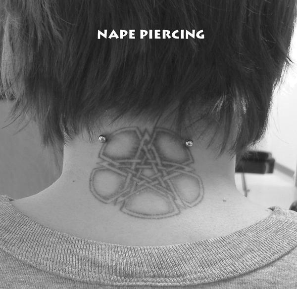 Tattoo And Surface Back Neck Piercing