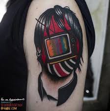 Television On Face Tattoo On Left