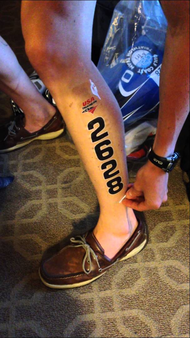 Temporary Triathlon Race Number Tattoo On Leg