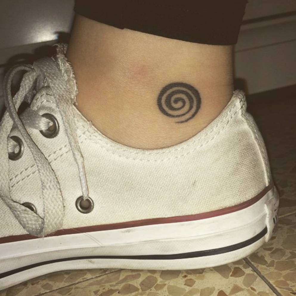 Tiny Spiral Tattoo On Ankle