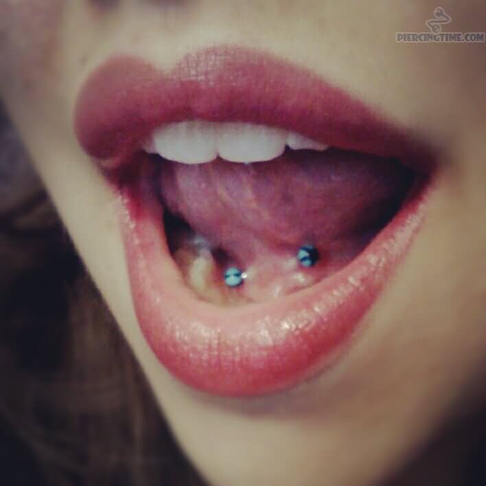 Tongue Frenulum Piercing With Blue Barbell