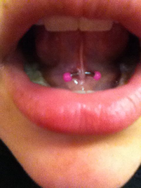 Tongue Frenulum Piercing With Pink Barbell