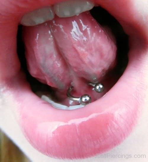 Tongue Frenulum Piercing With Silver Circular Barbell For Girls