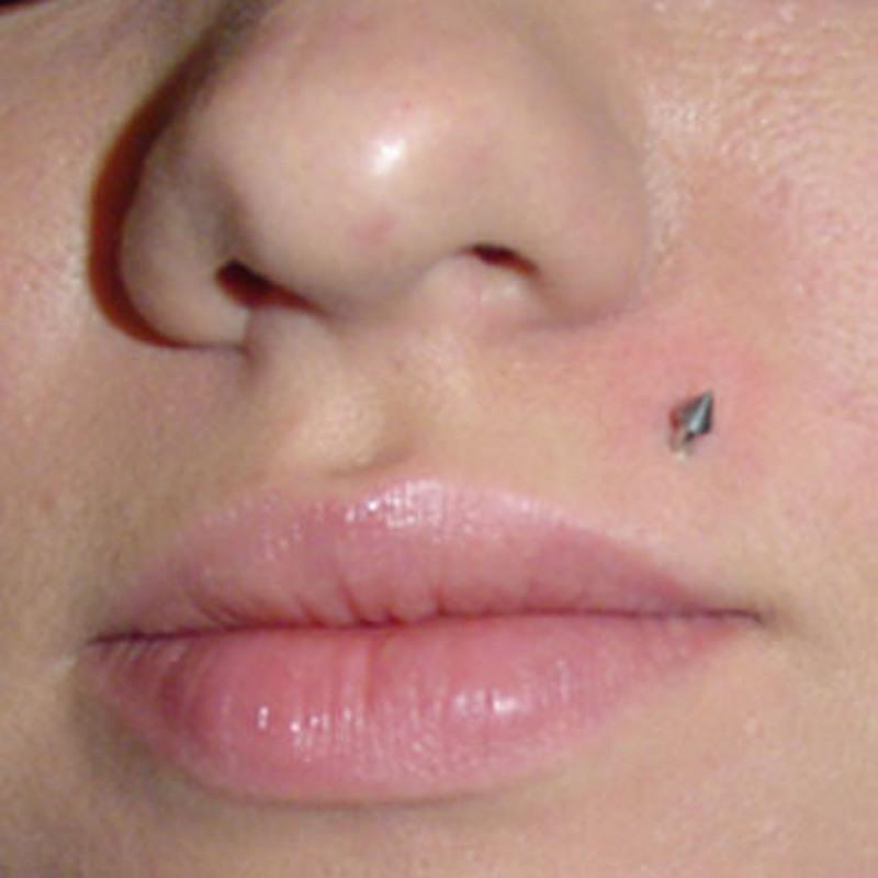 Top Lip Piercing With Spike Silver Stud