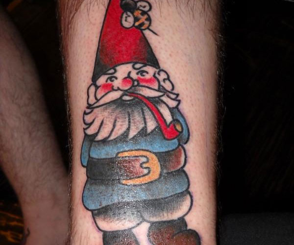 Traditional Spectacular Gnome Smoking Pipe Tattoo On Arm