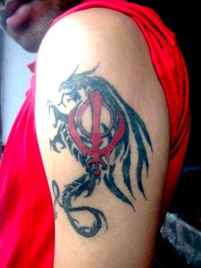 Tribal Dragon With Khanda Tattoo On Left Half Sleeve