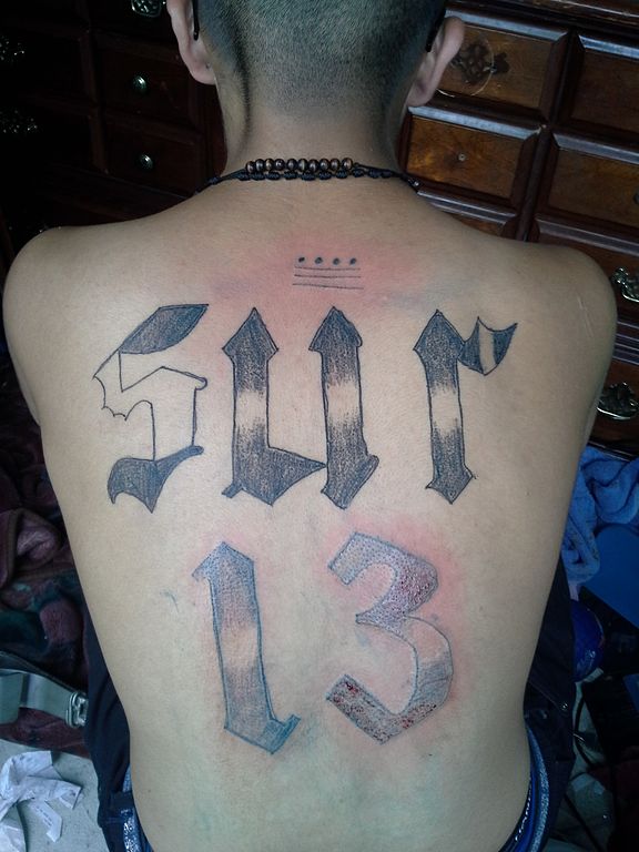 Tribute To Mexican Mafia Number Tattoo On Full Back