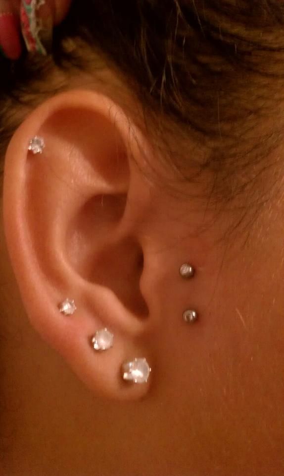 Triple Lobe Piercing And Surface Ear Piercing Picture