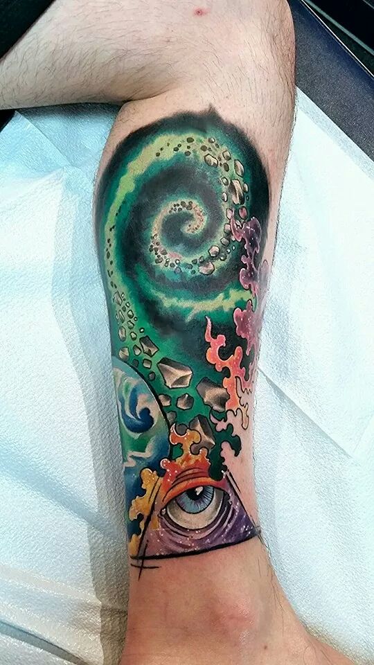 Unique Spiral Galaxy Tattoo On Leg By Paul Berkey