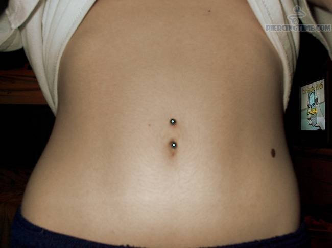 Vertical Surface Navel Piercing Picture For Girls