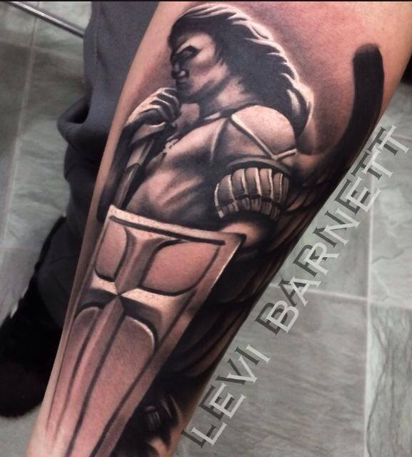 Warrior tattoo on arm by Levi Barnett