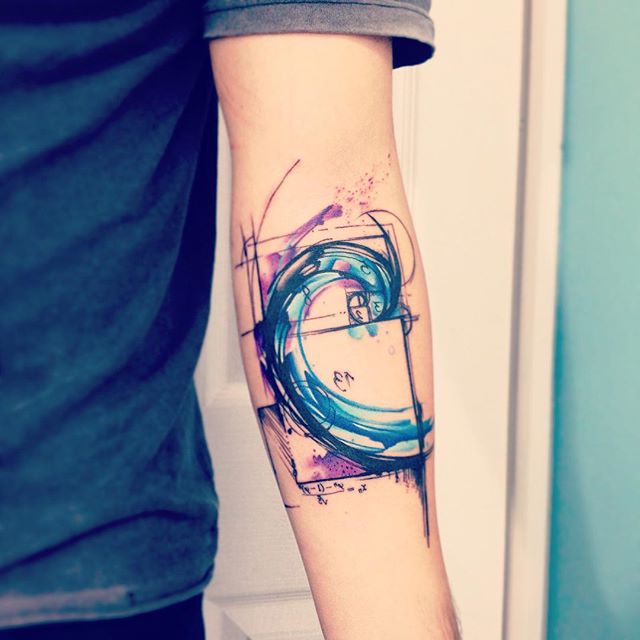 Watercolor Fibonacci Spiral Tattoo On Forearm