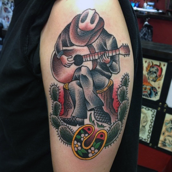 Western Man Playing Guitar Western Traditional Tattoo On Left Half Sleeve