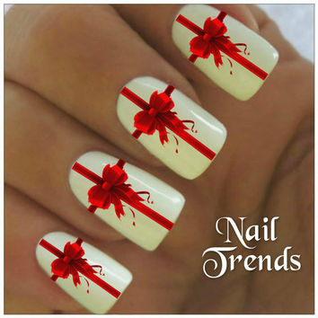 White Nails And Red Bow Design Christmas Nail Art