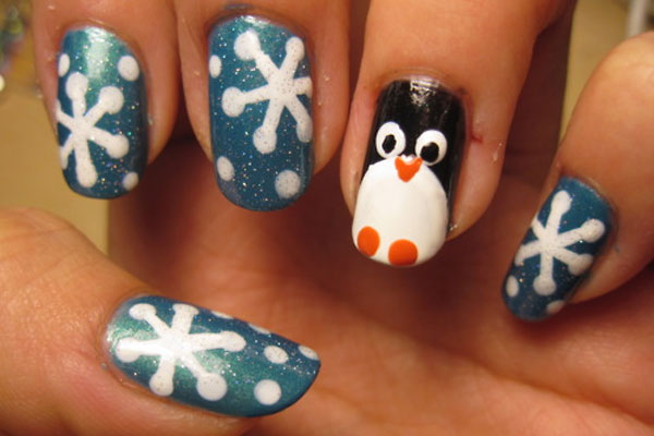 White Snowflakes And Penguin Design Christmas Nail Art
