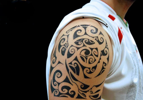Wonderful Maori Spiral Tattoo On Right Upper Arm For Men