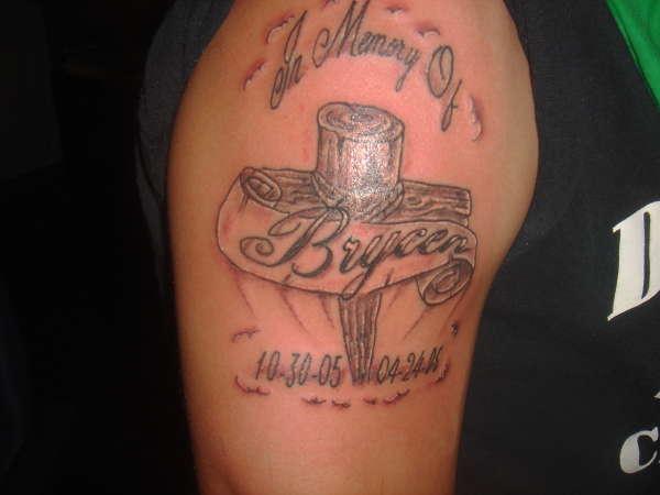 Wooden Cross Remembrance Tattoo On Right Shoulder