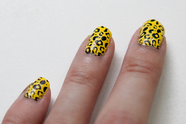 Yellow And Black Leopard Print Nail Art