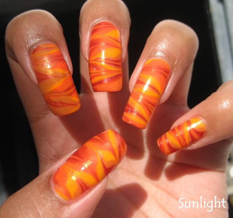 Yellow And Orange Water Marble Nail Art Design Idea