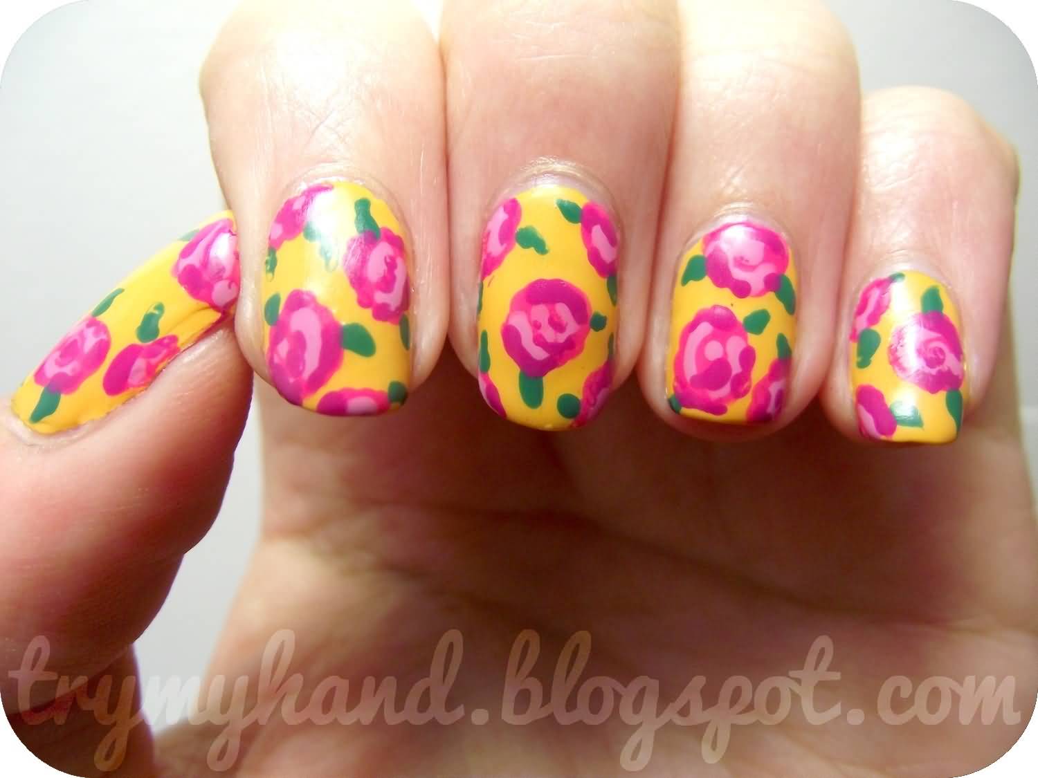 Yellow Base Nails With Pink Flowers Design Nail Art