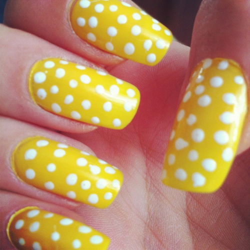 Yellow Base Nails With White Polka Dots Design Nail Art