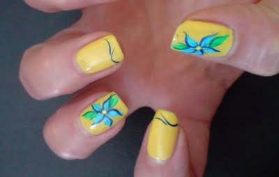 Yellow Nails With Blue Flowers Design Nail Art