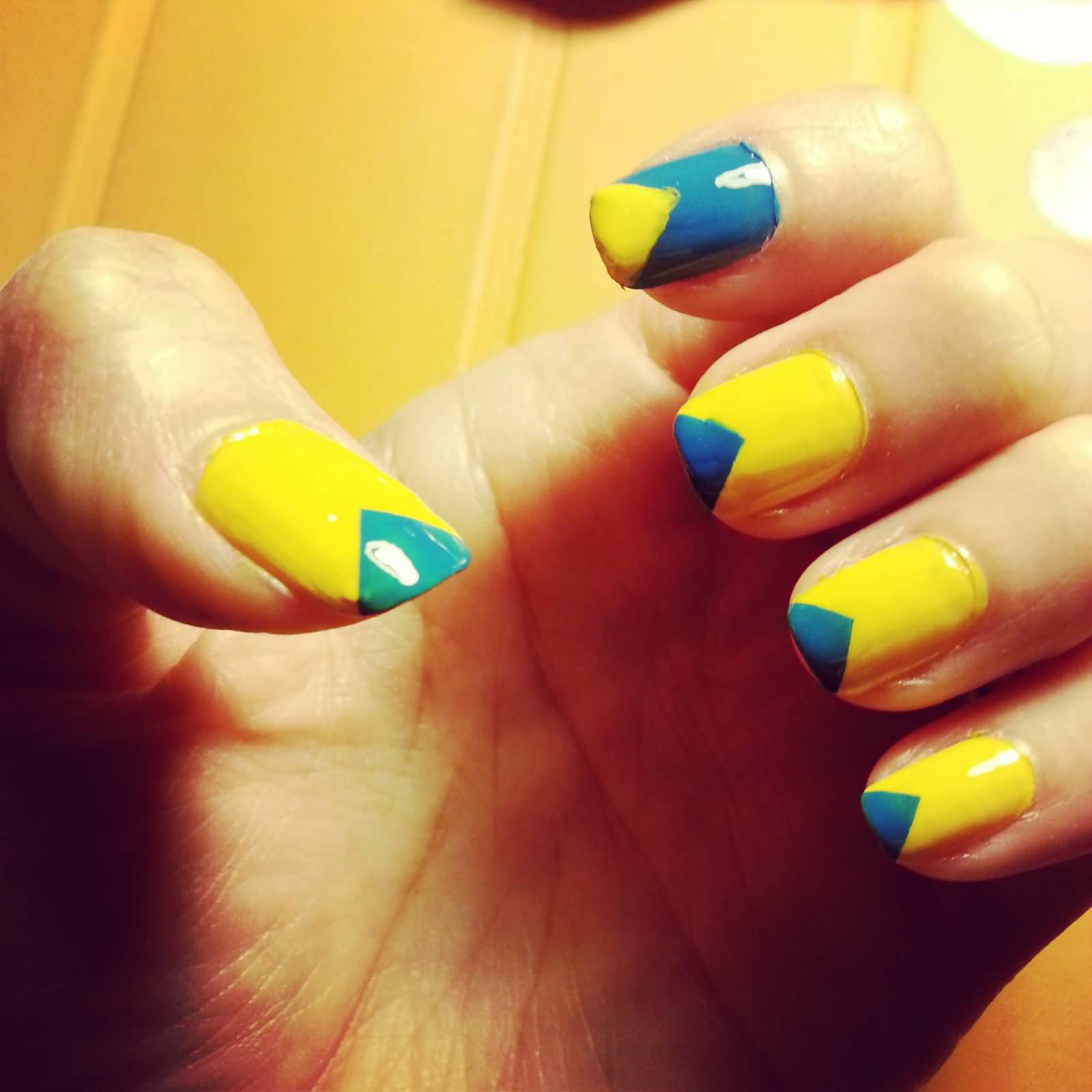Yellow Nails With Blue Triangle Tip Design Nail Art