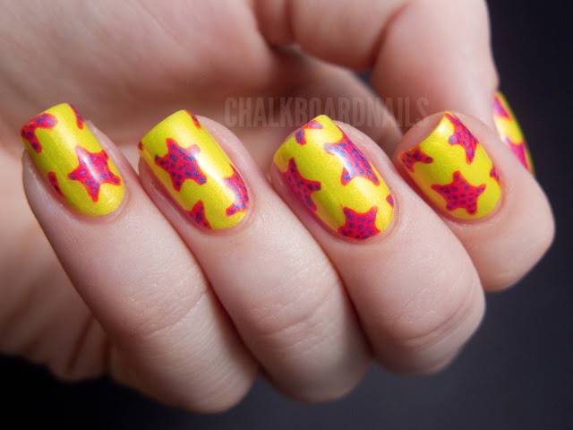 Yellow Nails With Pink Star Fish Design Nail Art