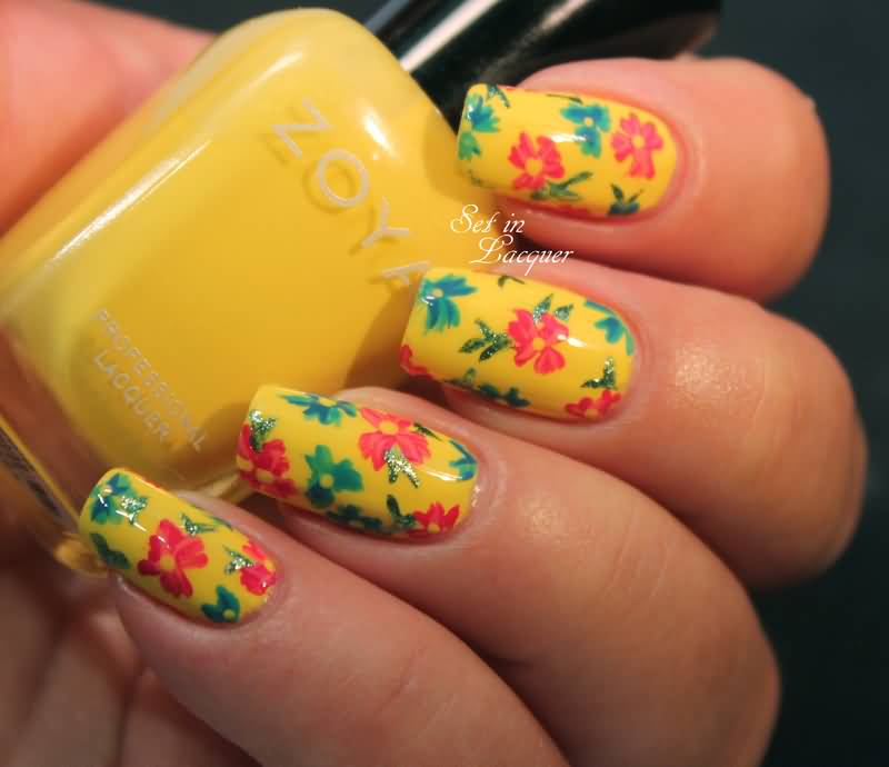Yellow Nails With Red And Green Flowers Nail Art