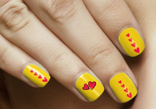 Yellow Nails With Red Hearts Nail Art