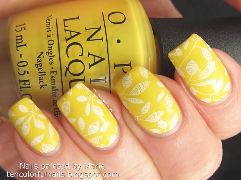 Yellow Nails With White Stamped Flowers Nail Art Design Idea
