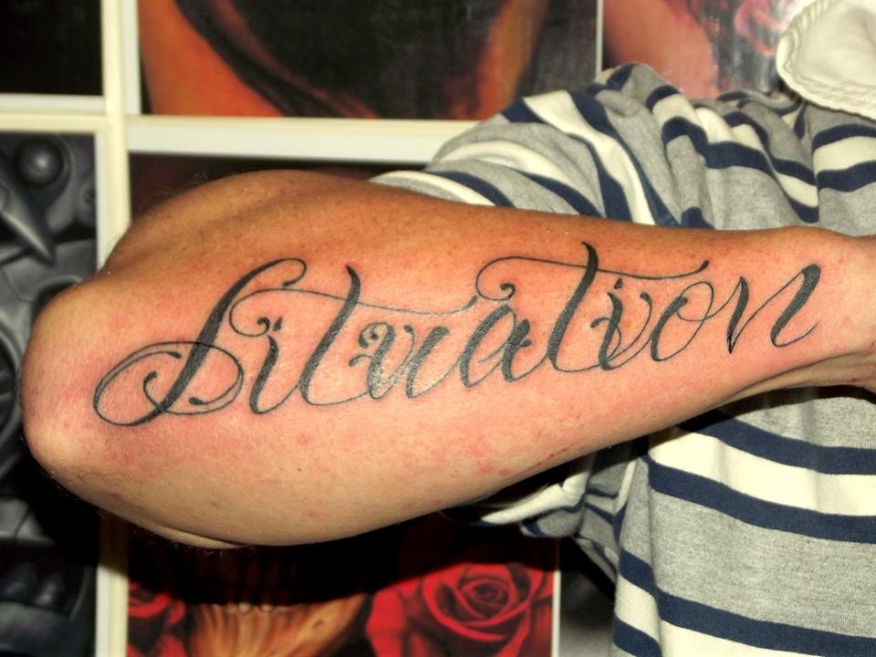 Cursive Script tattoo by Clinton Osborne at Eternal Tattoo, Shepparton, Australia.