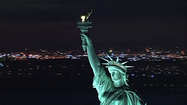 Aerial Orbit Statue Of Liberty Closeup At Night