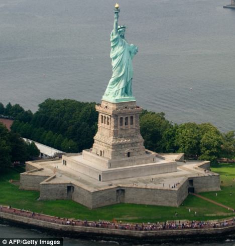 Aerial View Of Statue Of Liberty And Liberty Island