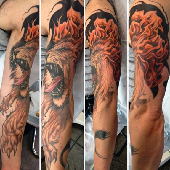 Amazing Flaming Lion Head Tattoo On Half Sleeve