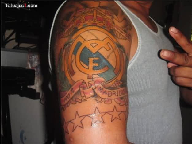Attractive Real Madrid Logo With Stars Tattoo On Right Half Sleeve